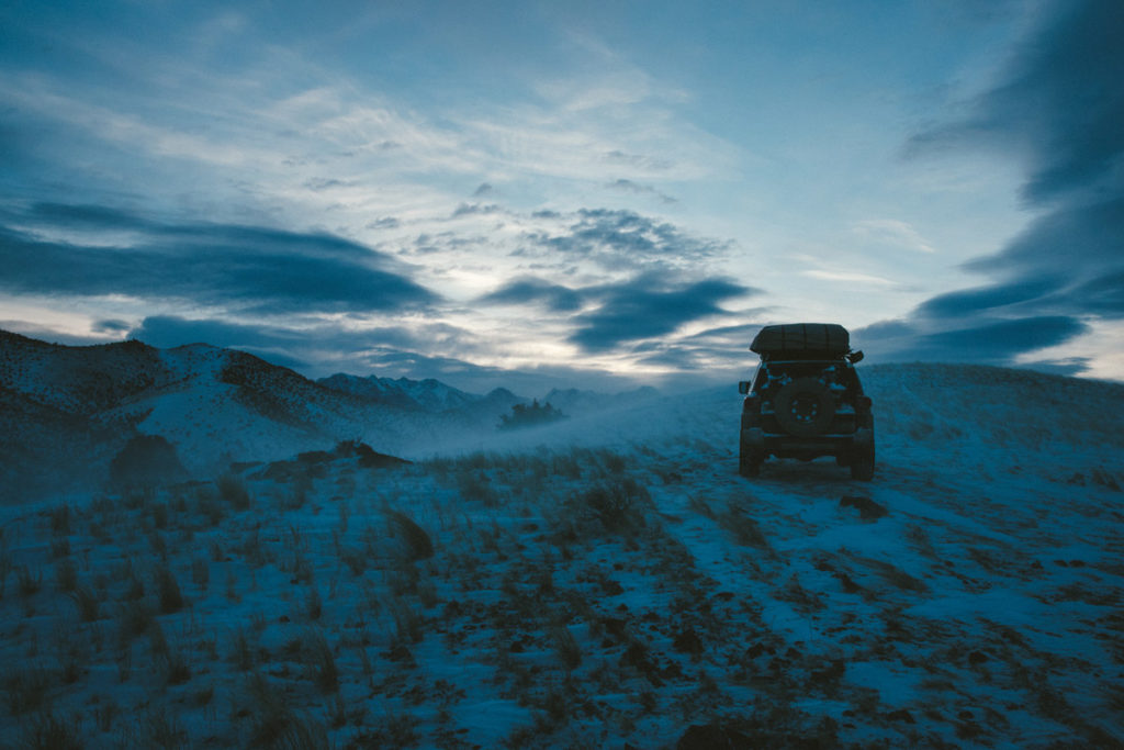  Casey and Brad survey the valley from their vehicle