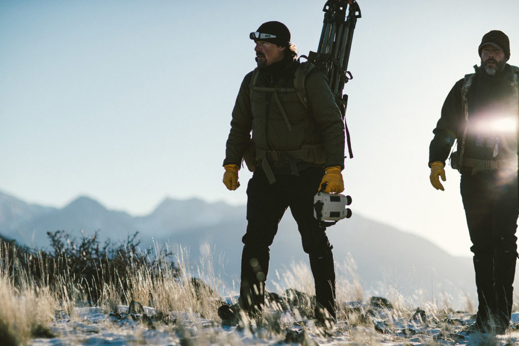 Casey carries FLIR thermal binoculars, a tool to spot heat signals from camouflaged animals.